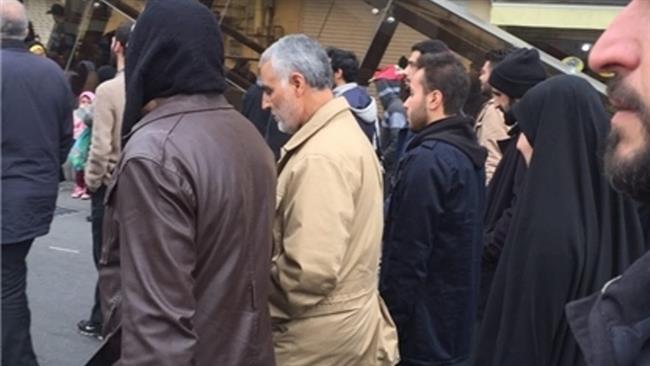 Commander of the Quds Force of Iran’s Islamic Revolution Guards Corps (IRGC) Major General Qassem Soleimani (in light cream coat) joined the rallies in the capital, Tehran.
