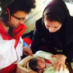 Woman stuck in snow gives birth (PHOTOS)