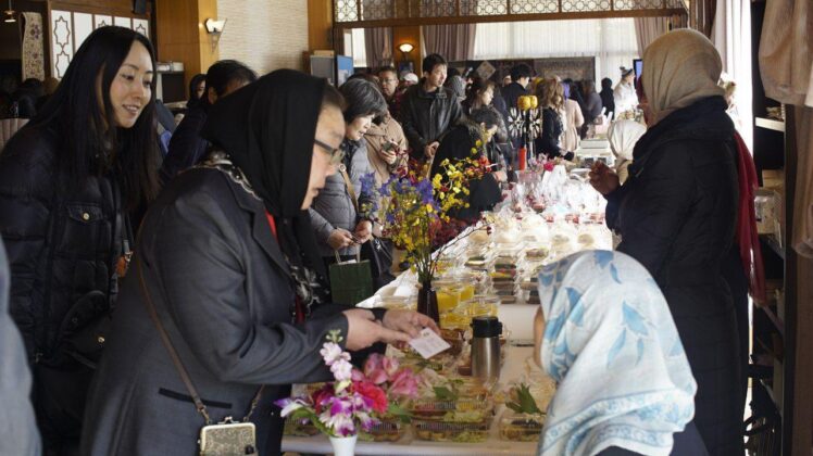 Charity Market Held in Japan to Help Iran’s Quake-Hit People