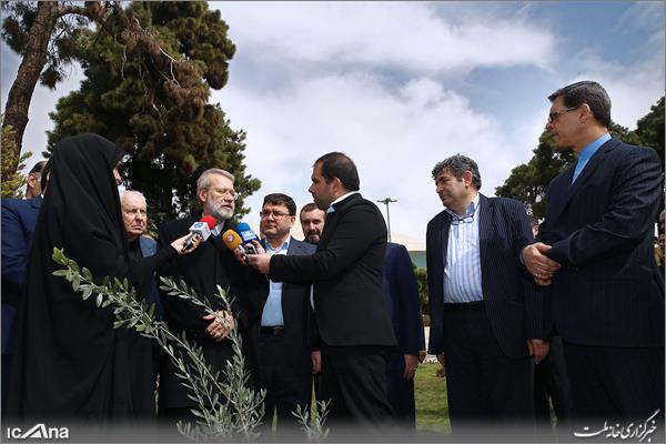 Iran’s Larijani Plants Olive Sapling as Sign of Peace on Arbour Day