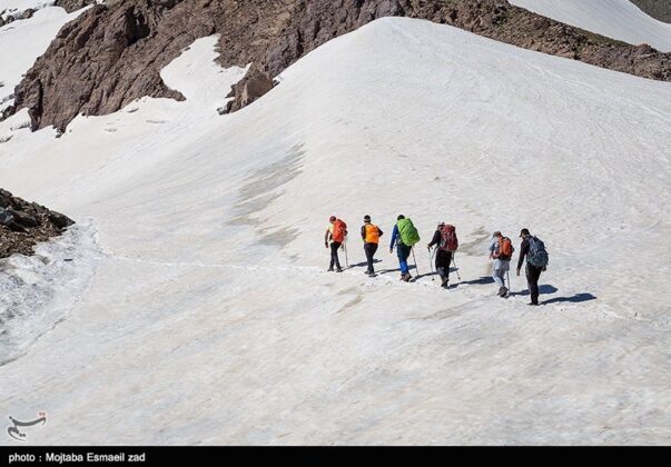 Joy of Climbing Snowy Summit in Summer