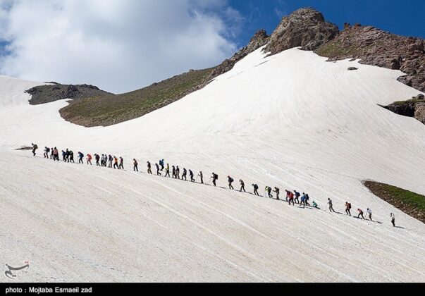Joy of Climbing Snowy Summit in Summer