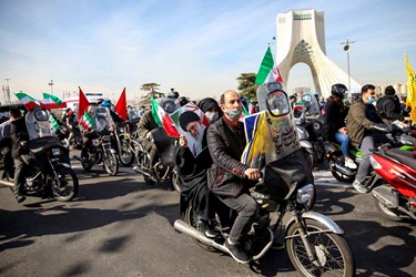Iranian People Attend Drive-in Parades to Mark 1979 Revolution