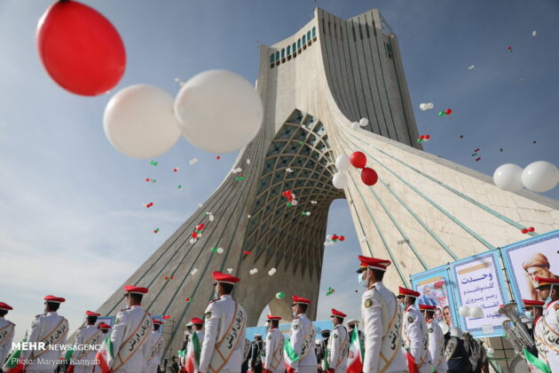 Iranian People Attend Drive-in Parades to Mark 1979 Revolution