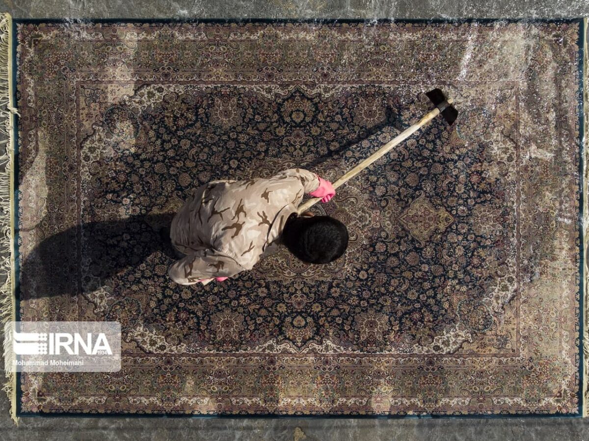 Iranians Wash Their Carpets Ahead of Nowruz
