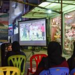 Bushehr Citizens Watch Iran-Iraq Football Match at Presidential Campaign Tents
