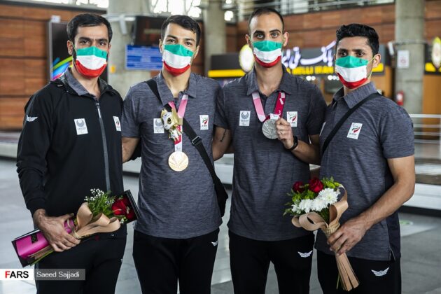 Iran Paralympic athletes get heroic welcome home