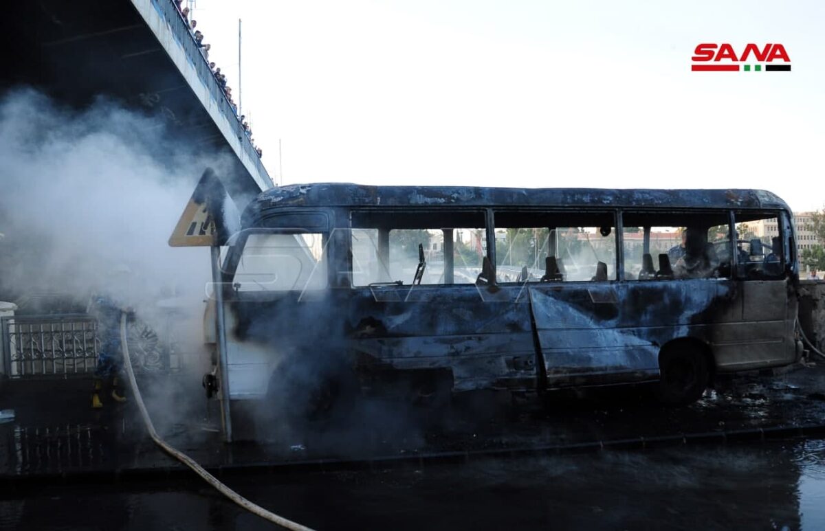 Over a dozen killed in Damascus twin blasts