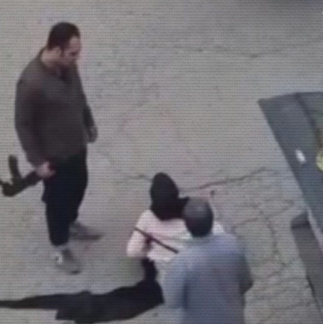 man beating woman in Dezfoul