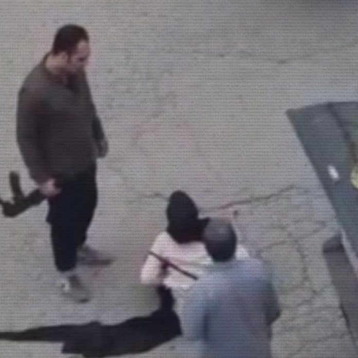 man beating woman in Dezfoul