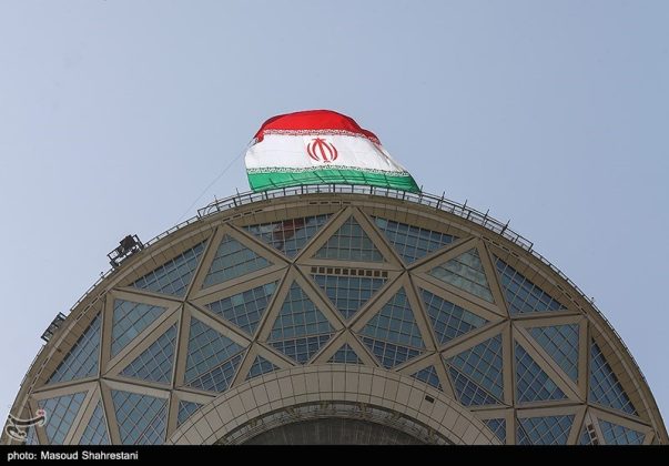 Parachutists jump off Tehran's Milad Tower to mark Islamic Republic Day