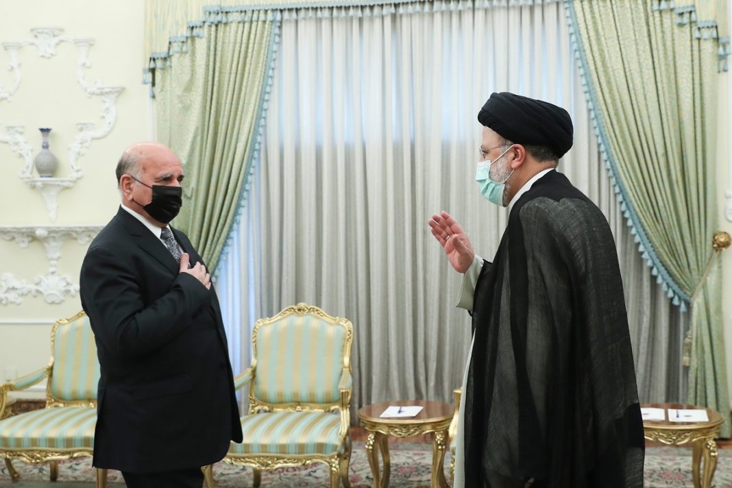 Iran President Ebrahim Raisi Iraqi Foreign Minister Fuad Hussein