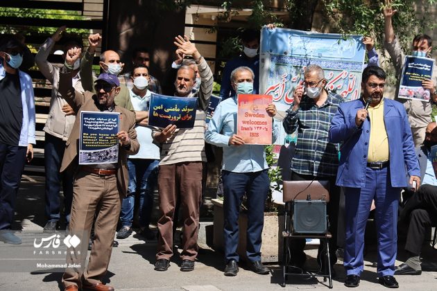 Iranians rally outside the Swedish embassy in Tehran