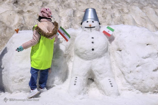 Summertime snowman festival in Tehran Tochal heights