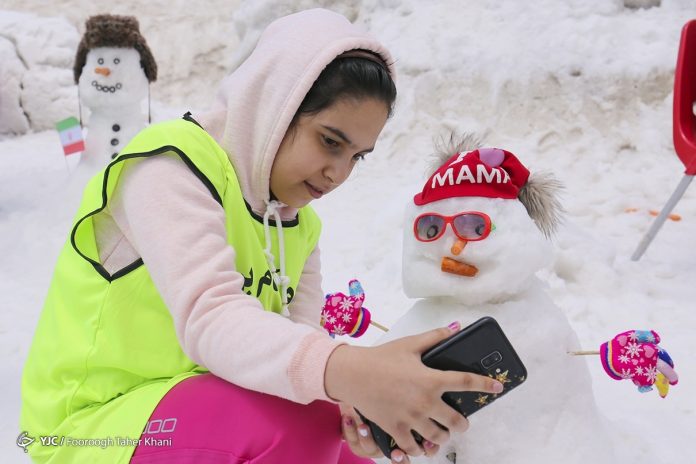 Summertime snowman festival in Tehran Tochal heights