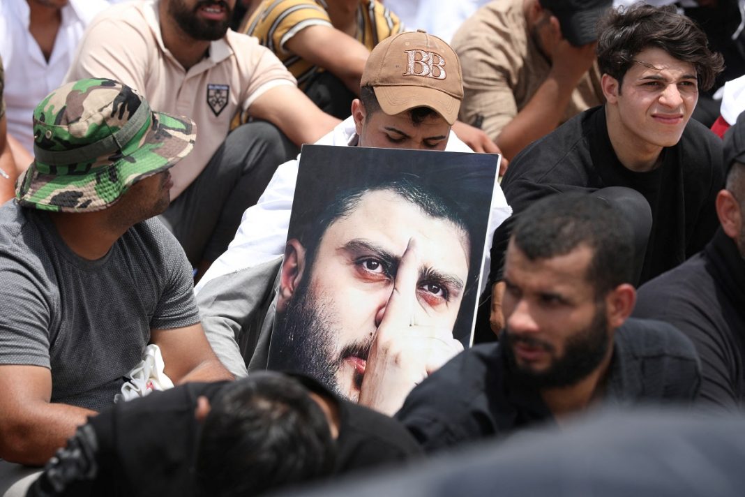 Supporters of Muqtada Sadr in prayer rally in Iraq