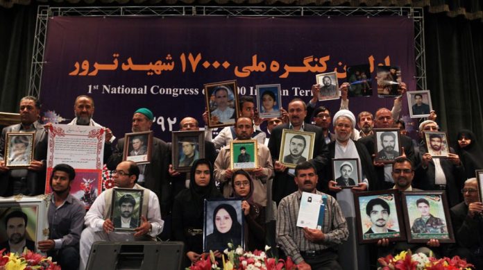 families of victims of terror at a national congress commemorating 17,000 Iranian terror martyrs