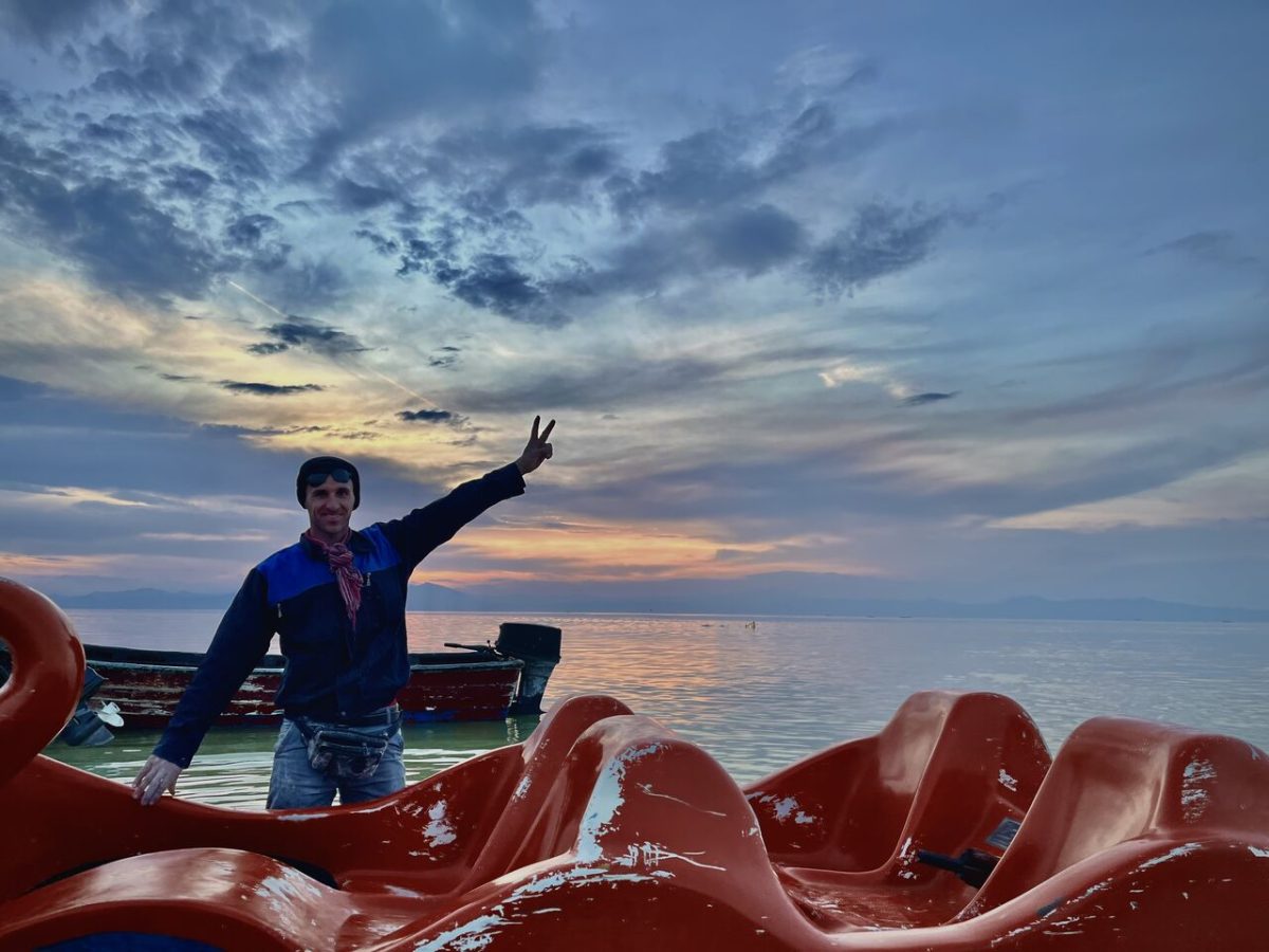 Beautiful sunset of Iran’s West Azerbaijan’s blue jewel on the horizon for boat riders