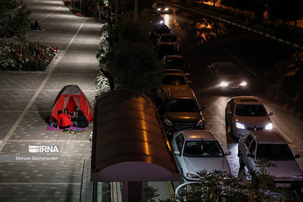 People in Iran’s Mashhad camp outdoors overnight after quake
