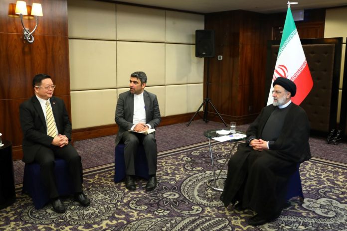 Raisi and Kao Kim Hourn