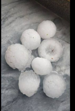 Large hail falls harm farms, cars in northwestern Iranian town