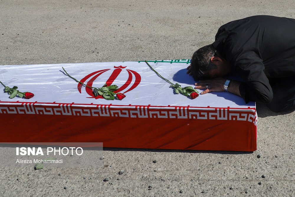 Iranians welcome back home newly-found bodies of soldiers killed in 1980s war with Iraq