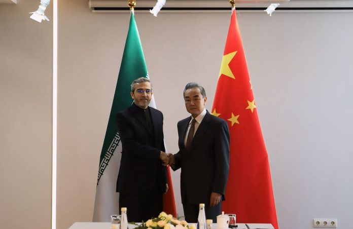 Wang Yi and Ali Bagheri Kani