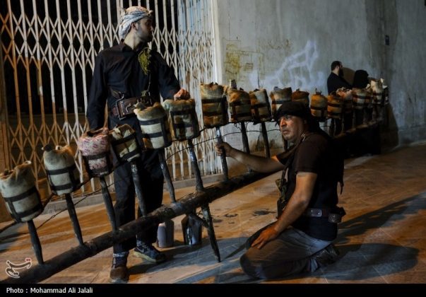 Najafis in Iran’s Qom mourn Imam Hussein’s martyrdom by torch-carrying rituals