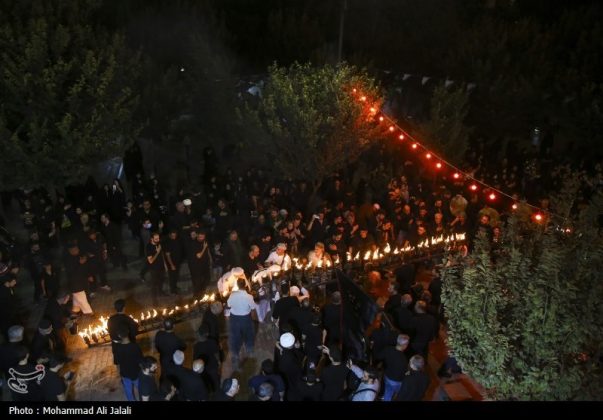 Najafis in Iran’s Qom mourn Imam Hussein’s martyrdom by torch-carrying rituals