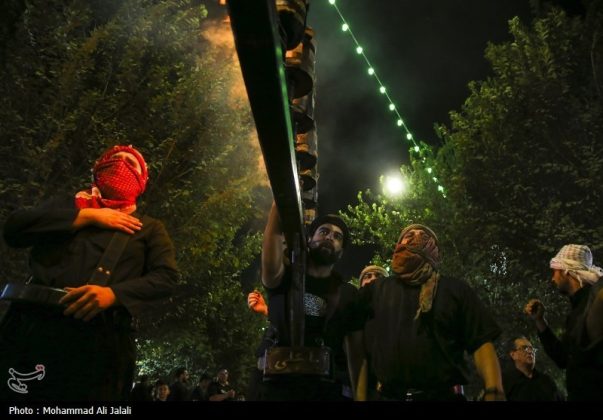 Najafis in Iran’s Qom mourn Imam Hussein’s martyrdom by torch-carrying rituals