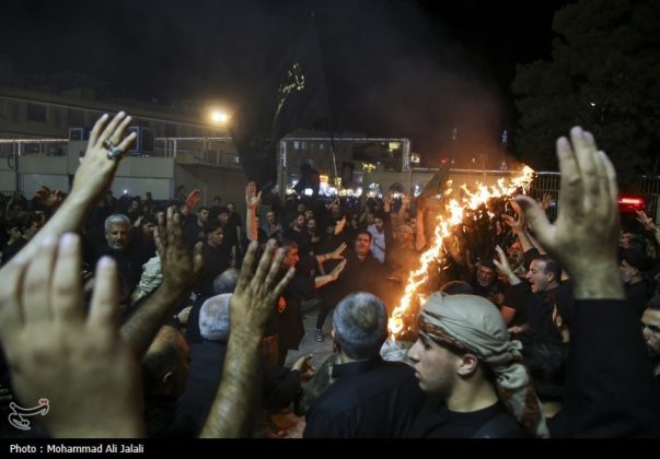 Najafis in Iran’s Qom mourn Imam Hussein’s martyrdom by torch-carrying rituals