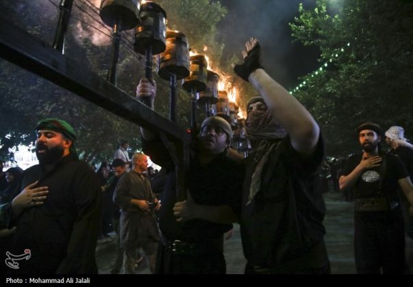 Najafis in Iran’s Qom mourn Imam Hussein’s martyrdom by torch-carrying rituals