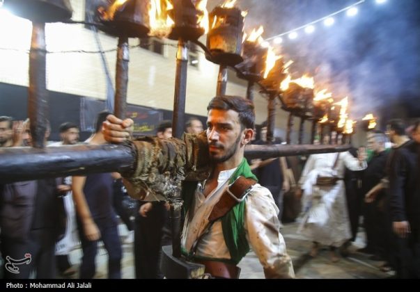 Najafis in Iran’s Qom mourn Imam Hussein’s martyrdom by torch-carrying rituals