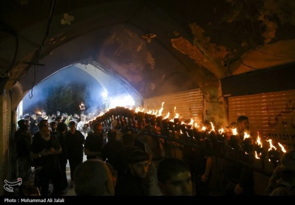 Najafis in Iran’s Qom mourn Imam Hussein’s martyrdom by torch-carrying rituals