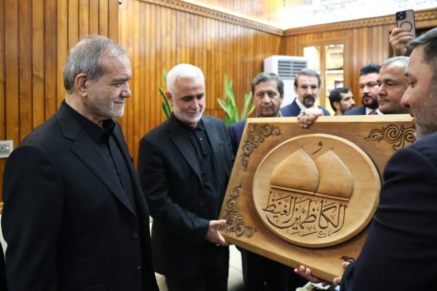 Iranian president visits holy shrines during Iraq trip