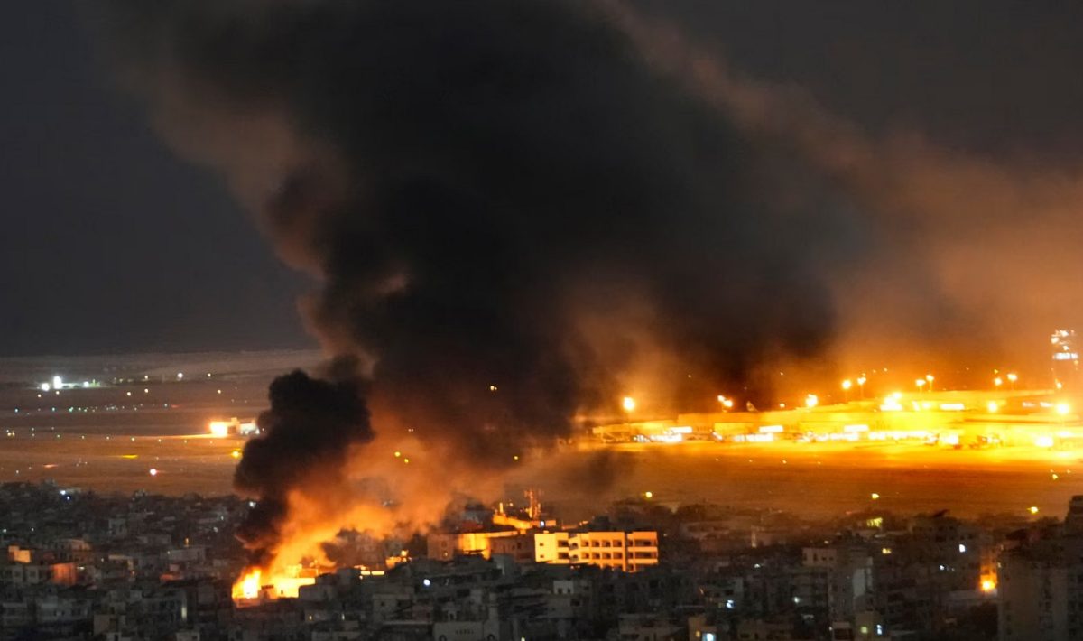 Israel conducts air attacks on 'Hezbollah's financial arm', as Lebanese flee homes