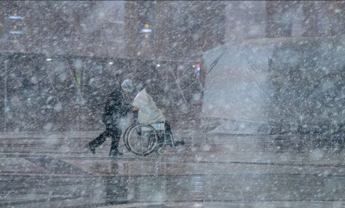 Pictures: A serene dance of snow at Imam Reza's shrine