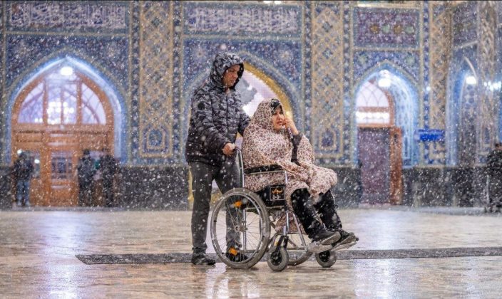 Pictures: A serene dance of snow at Imam Reza's shrine