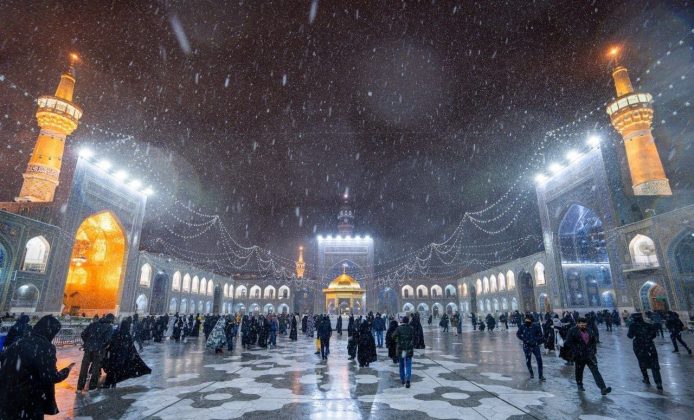 Pictures: A serene dance of snow at Imam Reza's shrine